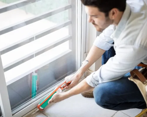 closeup-young-handyman-applying-some-sealant-door-with-sealing-gun_662251-2740 closeup-young-handyman-applying-some-sealant-door-with-sealing-gun_662251-2740